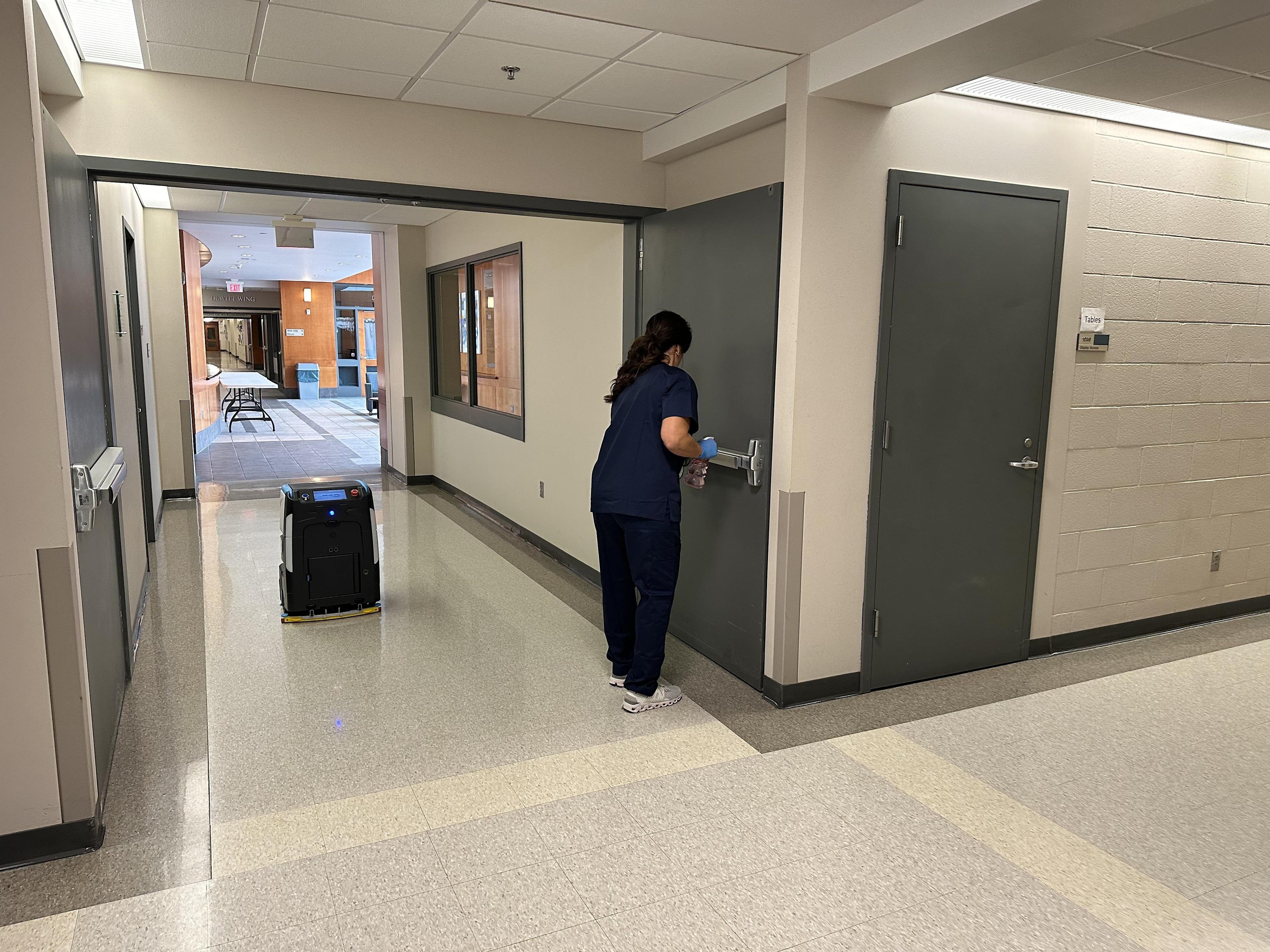 Higher Ed facilities maintenance and janitorial team using Cobi 18, autonomous floor scrubber to increase productivity