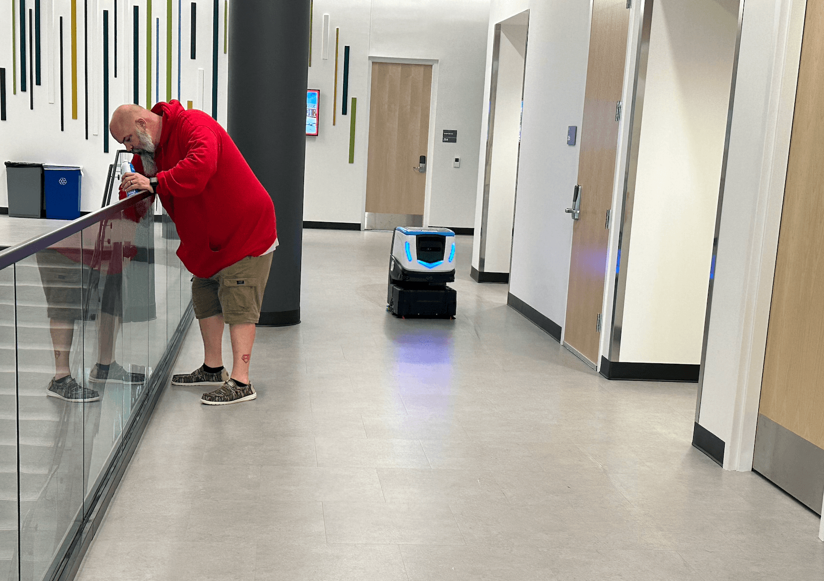 Cobi 18 robotic scrubber supporting custodial staff in higher ed facility