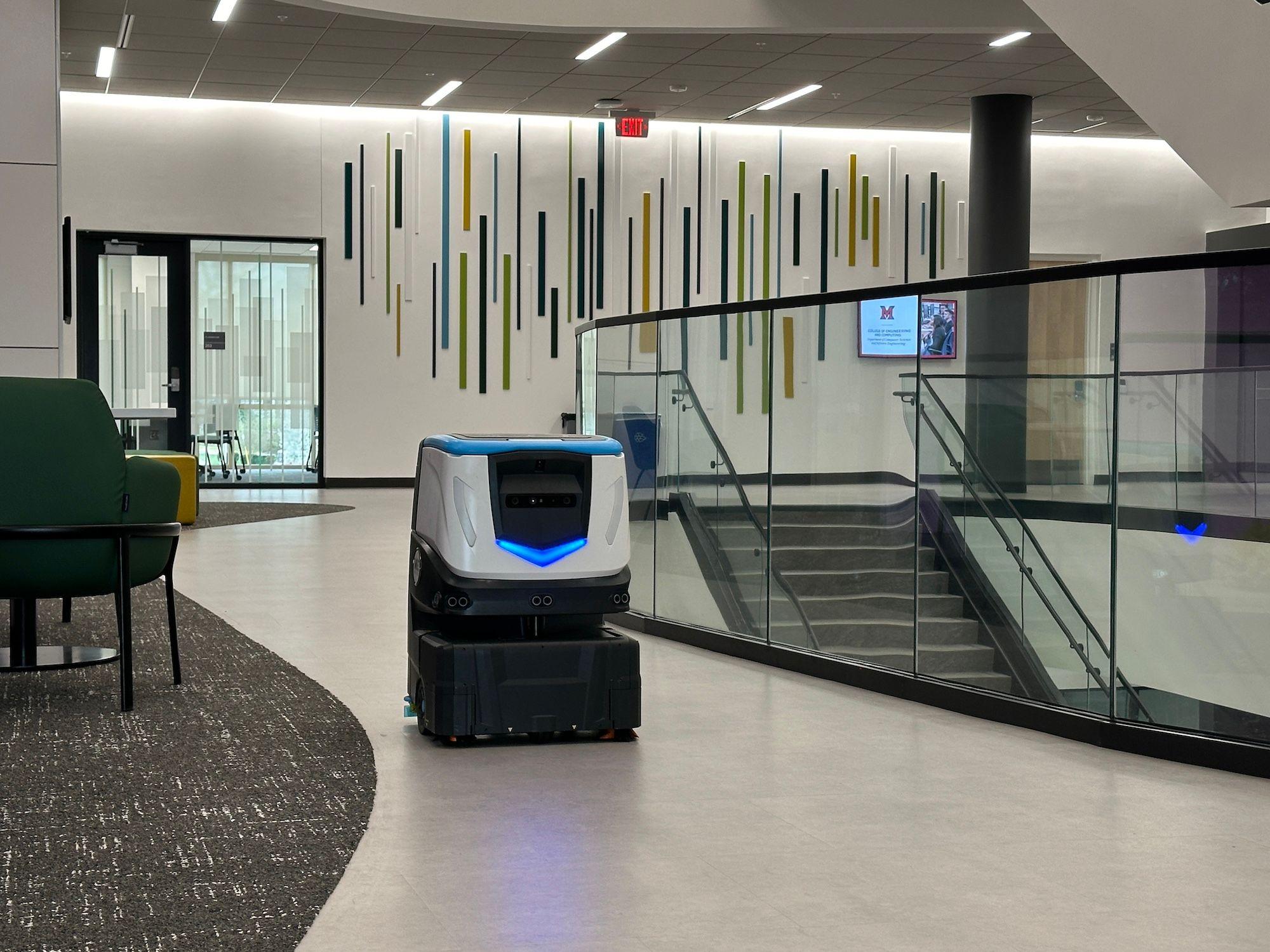 Cobi 18 robotic scrubber cleaning at higher ed facility