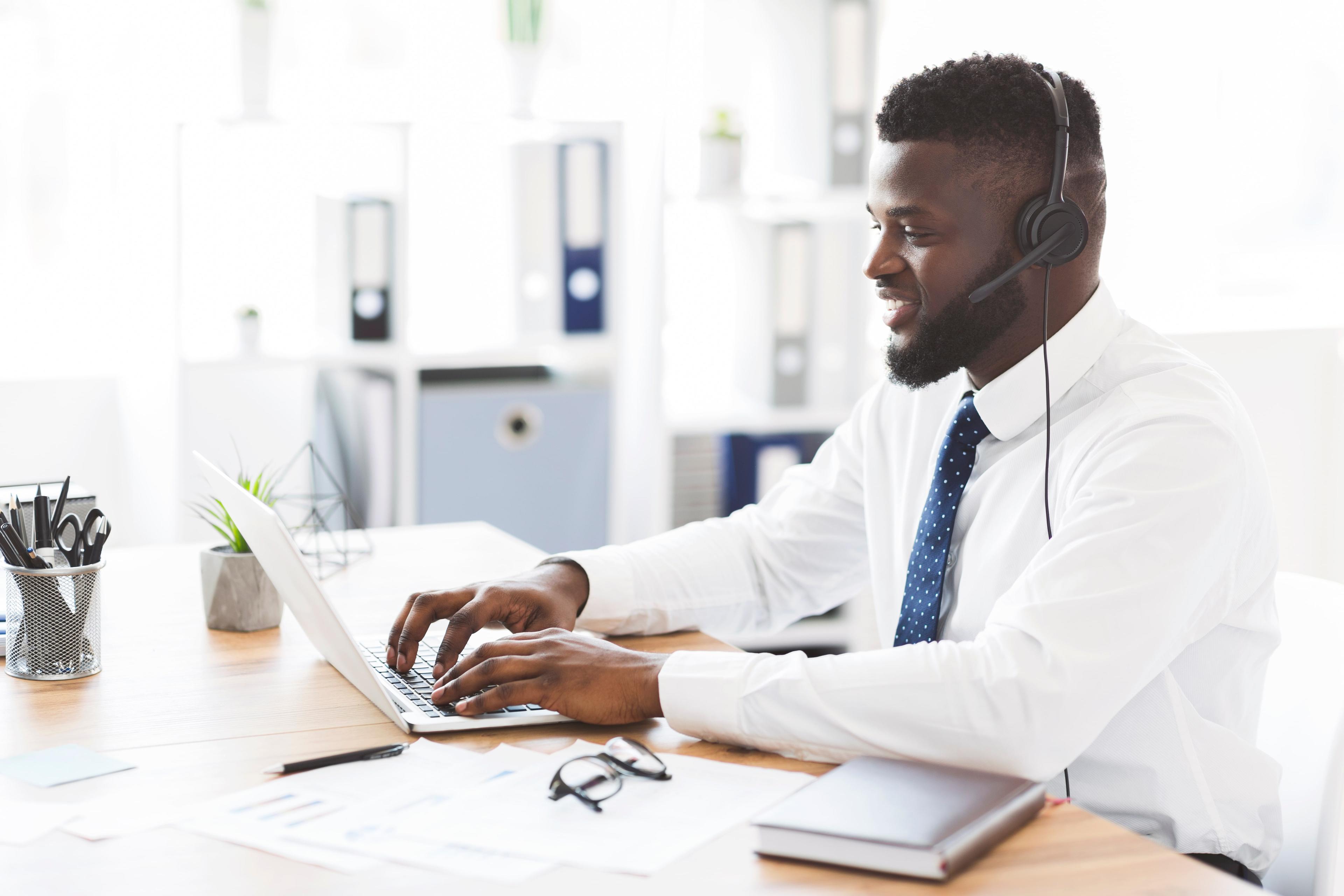 employee working in office on computer