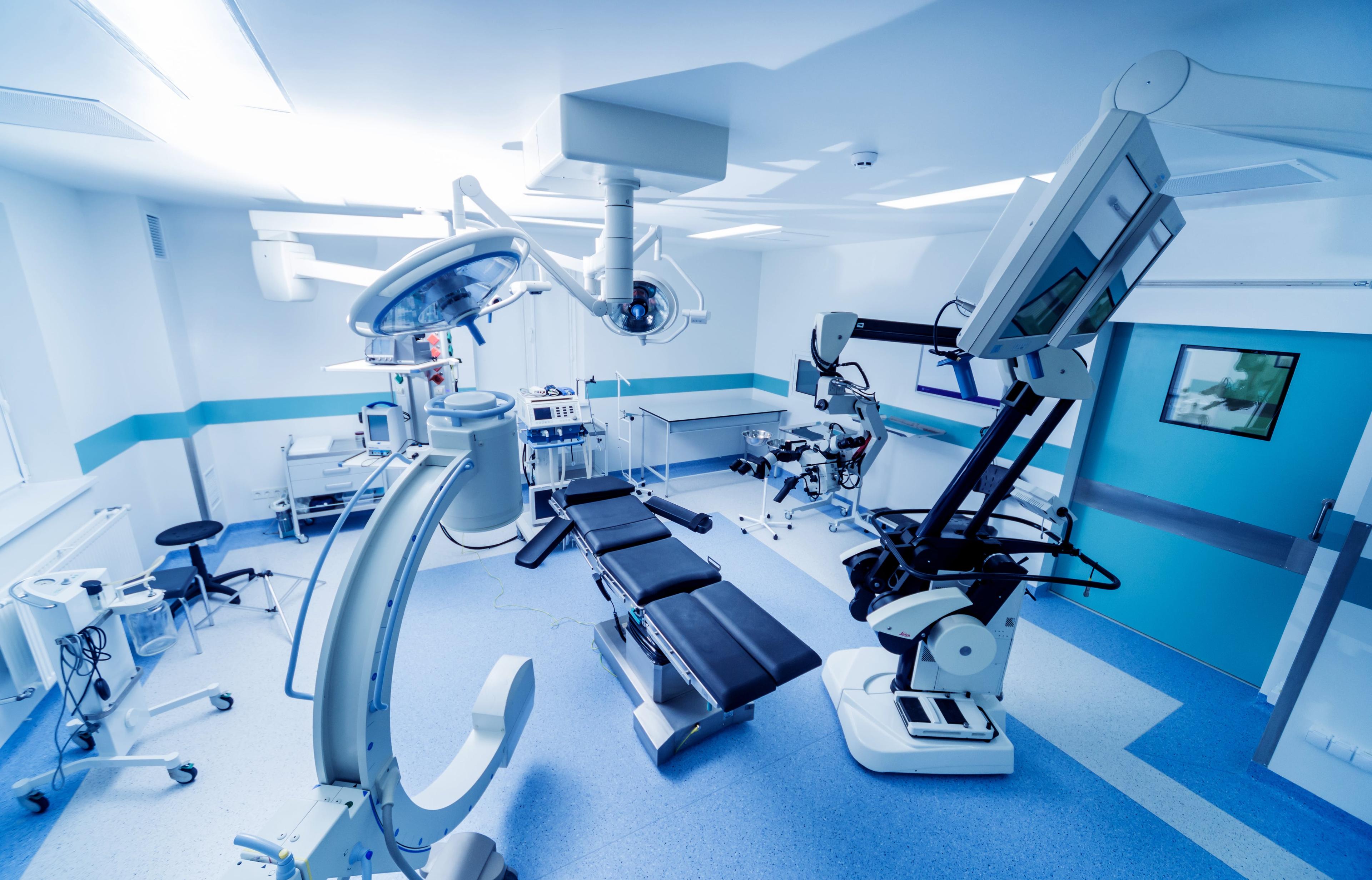Healthcare facility using robotics equipment in patient room for procedures