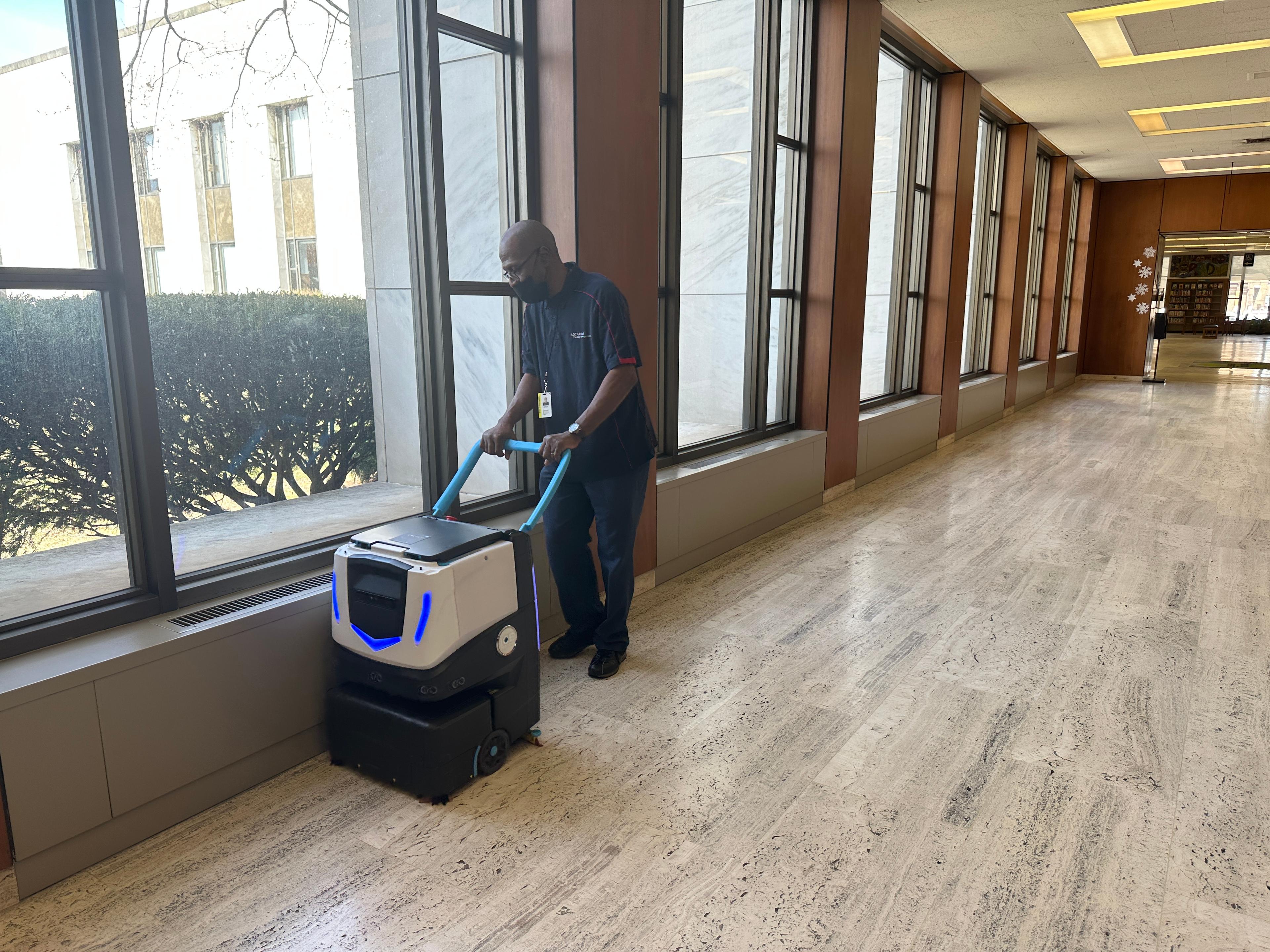 LGC Floor Tech cleaning library with robotic floor scrubber, Cobi 18 by ICE Cobotics