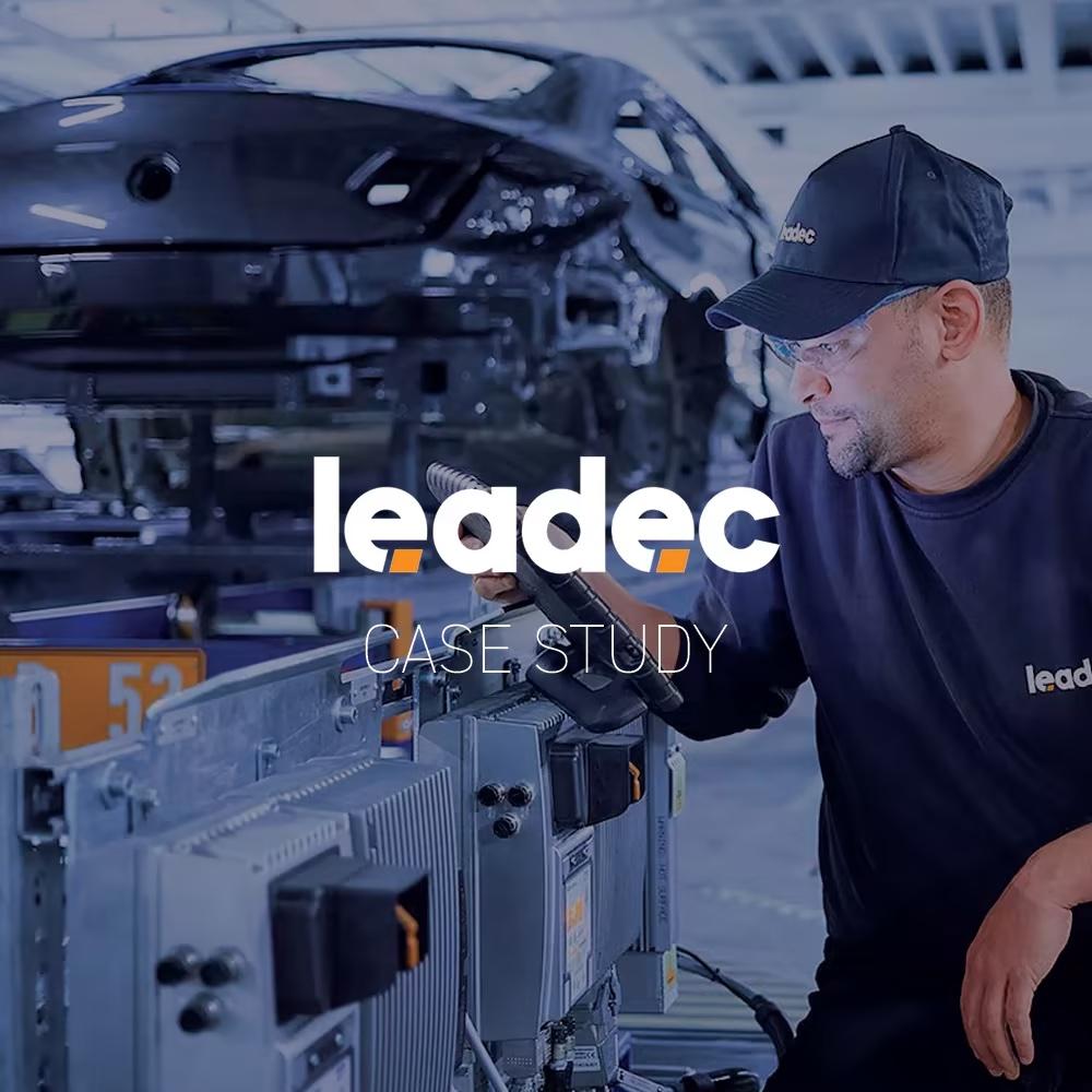 person working in a manufacturing plant with Leadec logo juxtaposed over the image